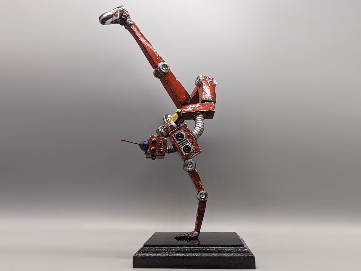 retrobot-groove-dancing-robot-statue-sculpture-2