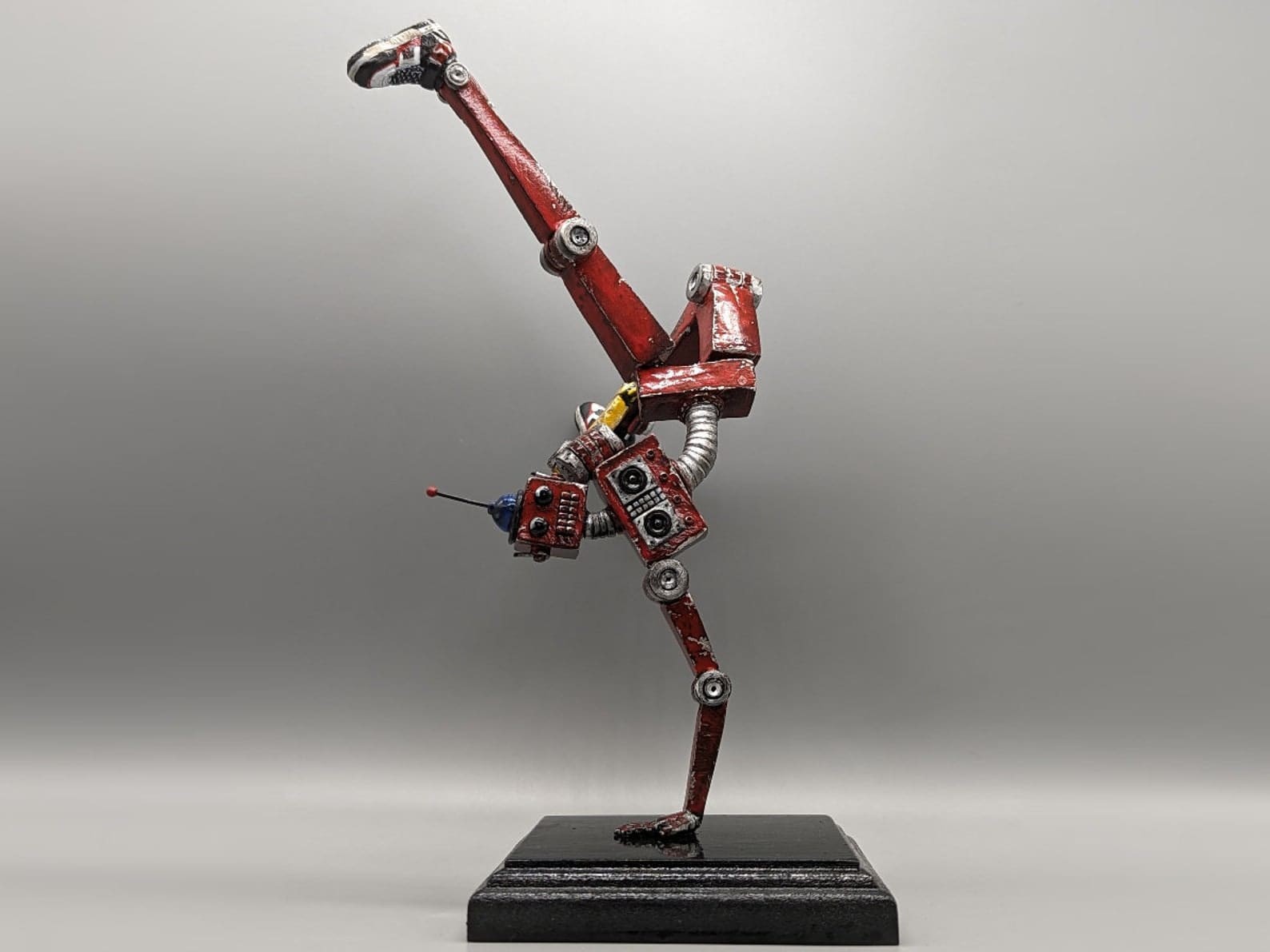 retrobot-groove-dancing-robot-statue-sculpture